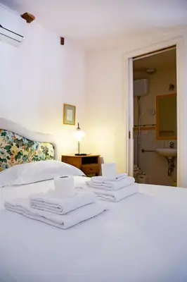 Letto o letti in una camera di Tranquil Suite Near David
