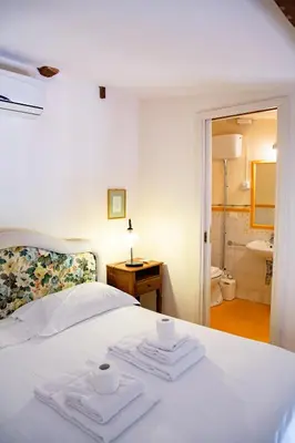 Letto o letti in una camera di Tranquil Suite Near David