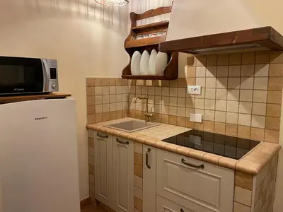 Cucina o angolo cottura di Porta del Chianti Tuscany Apartment