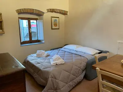 Letto o letti in una camera di Porta del Chianti Tuscany Apartment