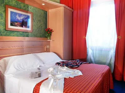 Letto o letti in una camera di Hotel Meridiana