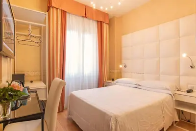Letto o letti in una camera di Hotel Jane