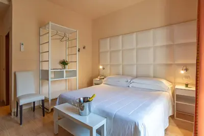 Letto o letti in una camera di Hotel Jane