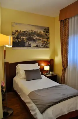 Letto o letti in una camera di Hotel Hermitage
