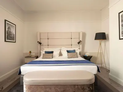 Letto o letti in una camera di Cerretani Hotel Firenze - MGallery Collection