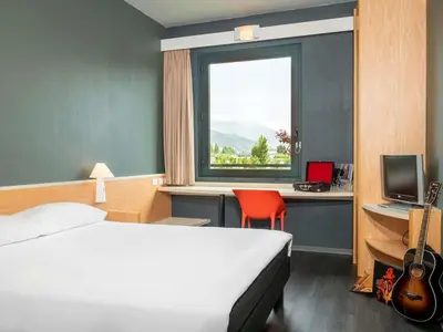 Letto o letti in una camera di Hotel Ibis Firenze Prato Est