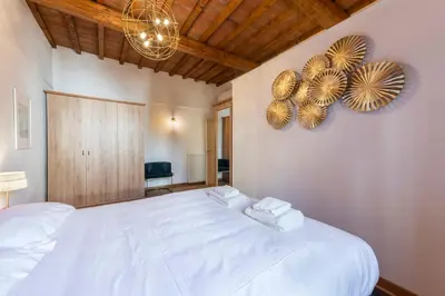 Letto o letti in una camera di Rosé by Mmega