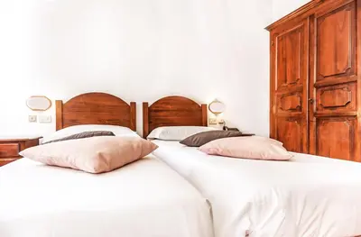 Letto o letti in una camera di Hotel Costantini