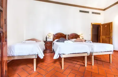 Letto o letti in una camera di Hotel Costantini