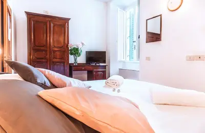 Letto o letti in una camera di Hotel Costantini