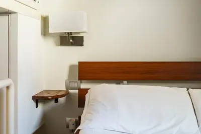 Letto o letti in una camera di Corso Double