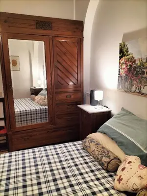 Letto o letti in una camera di Florentine style apartment in San Frediano