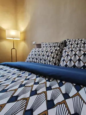 Letto o letti in una camera di Casa del Moro