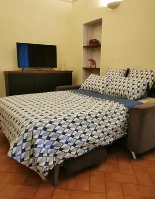Letto o letti in una camera di Casa del Moro