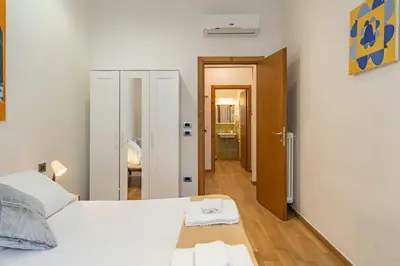 Letto o letti in una camera di San Zanobi Suites- by MOIS Collection