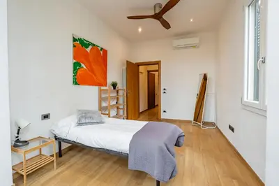 Letto o letti in una camera di San Zanobi Suites- by MOIS Collection