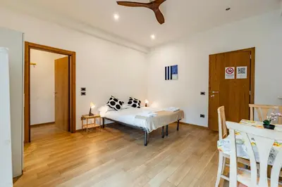 Letto o letti in una camera di San Zanobi Suites- by MOIS Collection