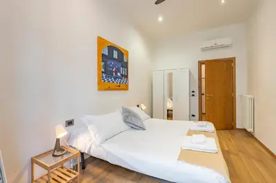 Letto o letti in una camera di San Zanobi Suites- by MOIS Collection