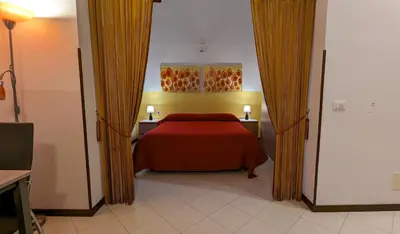 Letto o letti in una camera di Magnolia - Large and comfortable studio flat