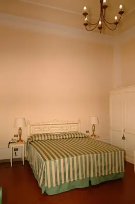 Letto o letti in una camera di Residence Michelangiolo