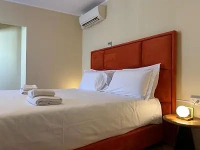 Letto o letti in una camera di Boboli Living