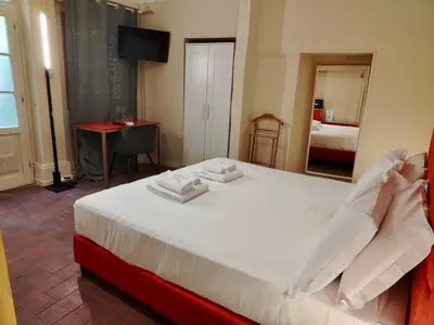 Letto o letti in una camera di Boboli Living