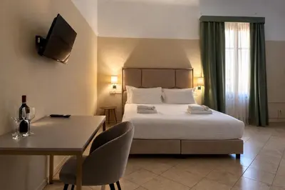 Letto o letti in una camera di Boboli Living