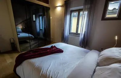 Letto o letti in una camera di Acacia Firenze - Girasole