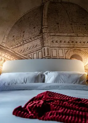 Letto o letti in una camera di Acacia Firenze - Girasole