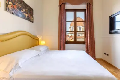 Letto o letti in una camera di Relais Hotel Centrale 