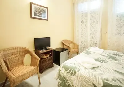 Letto o letti in una camera di Argentiere Room Apartments
