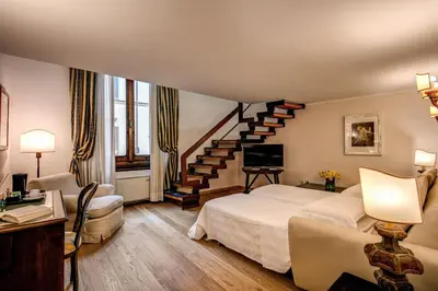 Letto o letti in una camera di Hotel Croce Di Malta