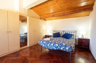 Letto o letti in una camera di Cavour 83