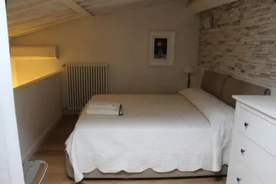 Letto o letti in una camera di Cosy flat in the heart of Florence