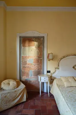 Letto o letti in una camera di Casa Leopardi