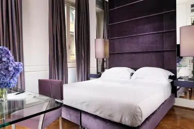 Letto o letti in una camera di Brunelleschi Hotel