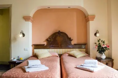 Letto o letti in una camera di Residenza Castiglioni