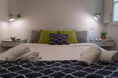 Letto o letti in una camera di 32 nero - Florence Apartment San Niccolò