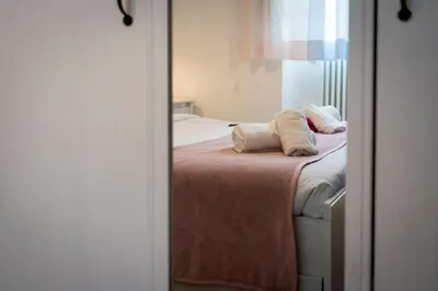 Letto o letti in una camera di 32 nero - Florence Apartment San Niccolò