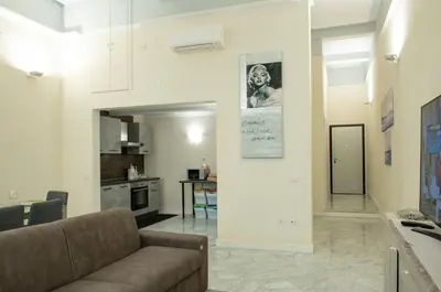 TV o dispositivi per l'intrattenimento presso Cavour Rosa Apartment by Mamo Florence
