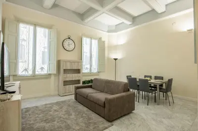 Area soggiorno di Cavour Rosa Apartment by Mamo Florence