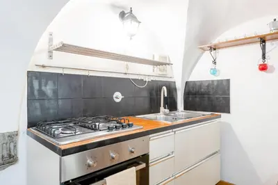 Cucina o angolo cottura di GuestHost - Cattedrale di Firenze Apartment