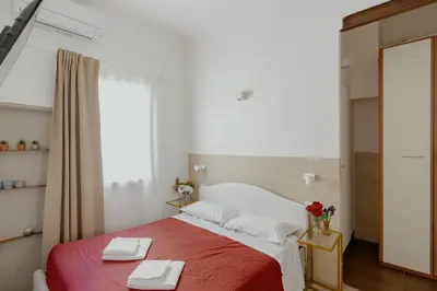 Letto o letti in una camera di 24 Duomo - Camera centralissima