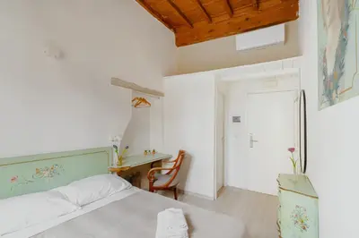 Letto o letti in una camera di 22 Duomo - Camera caratteristica