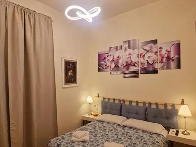 Letto o letti in una camera di Au jardin de Florence