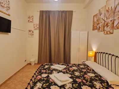 Letto o letti in una camera di Au jardin de Florence