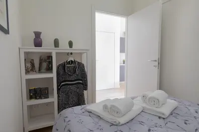 Letto o letti in una camera di Violetta Suite - Brand new flat - S. Maria Novella