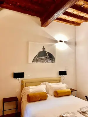 Letto o letti in una camera di Soggiorno La Pergola