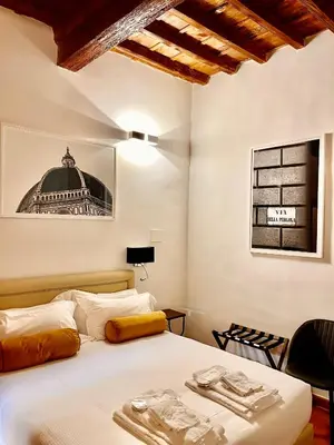Letto o letti in una camera di Soggiorno La Pergola
