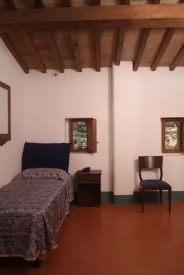 Letto o letti in una camera di Villa Morghen